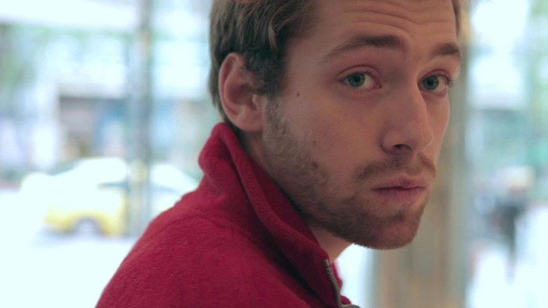 кадр из фильма Το Αγόρι Τρώει το Φαγητό του Πουλιού