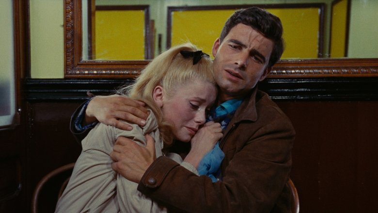 кадр из фильма Шербурские зонтики