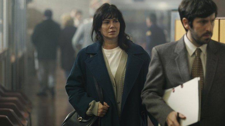 кадр из фильма Покойся с миром