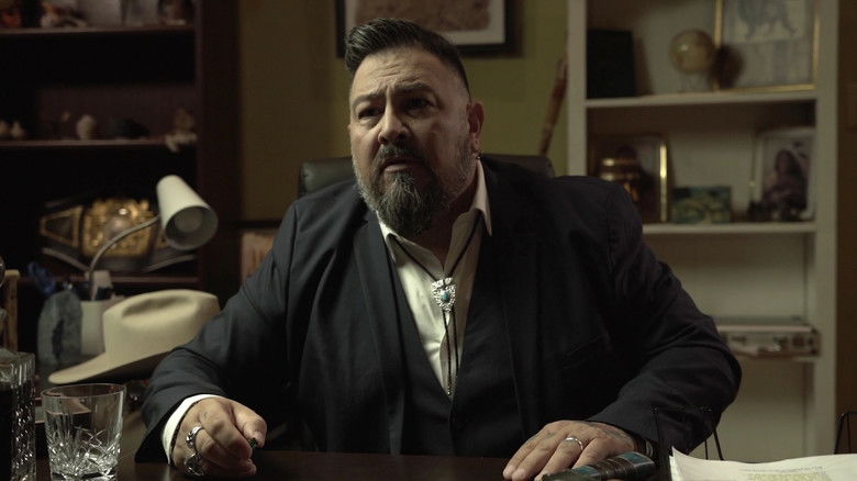 кадр из фильма Резня на кладбище