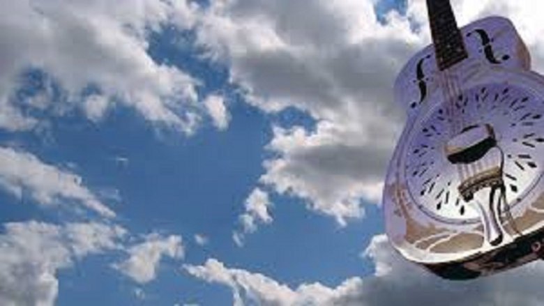 кадр из фильма Dire Straits Nîmes 92