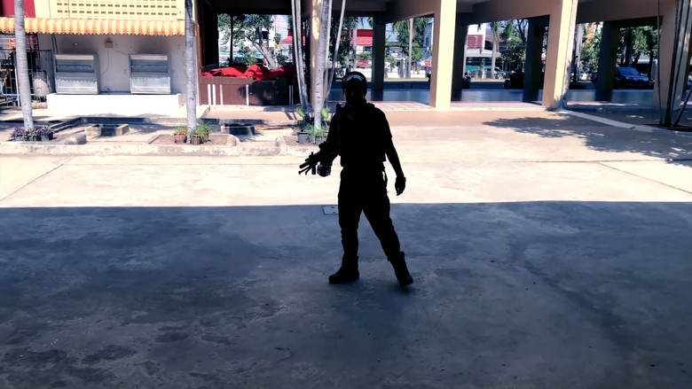 кадр из фильма The Killer