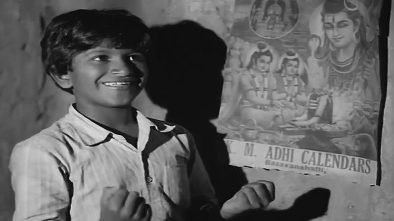 кадр из фильма ಟ್ಟದ ಹೂವು