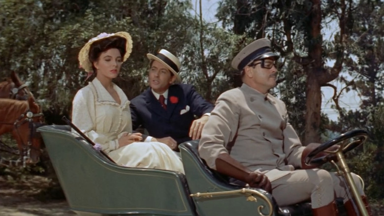 кадр из фильма The Girl in the Red Velvet Swing