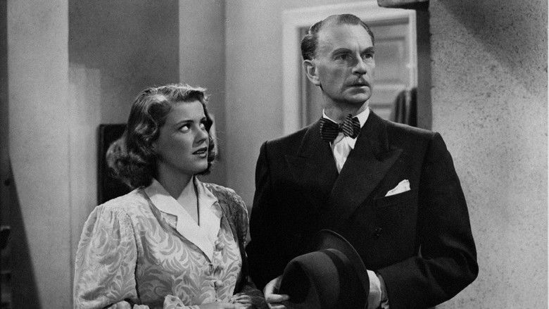 кадр из фильма Flickan i fönstret mitt emot