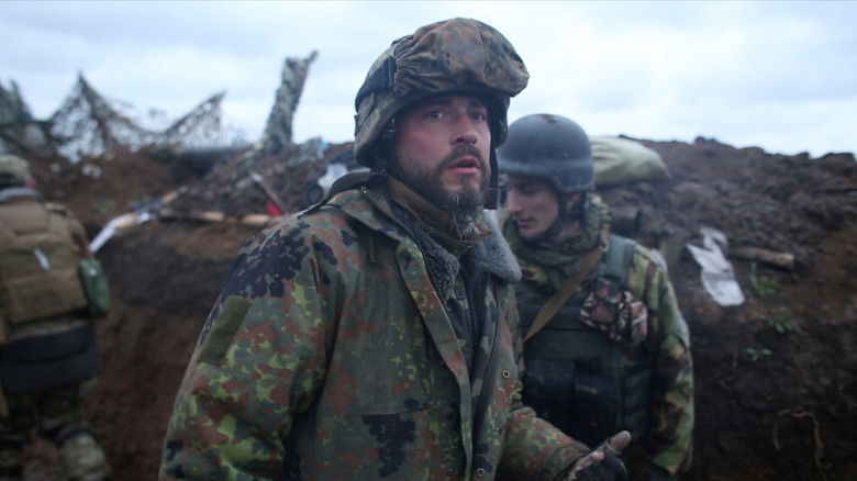 кадр из фильма Залізна Сотня