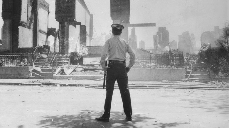 кадр из фильма Let the Fire Burn