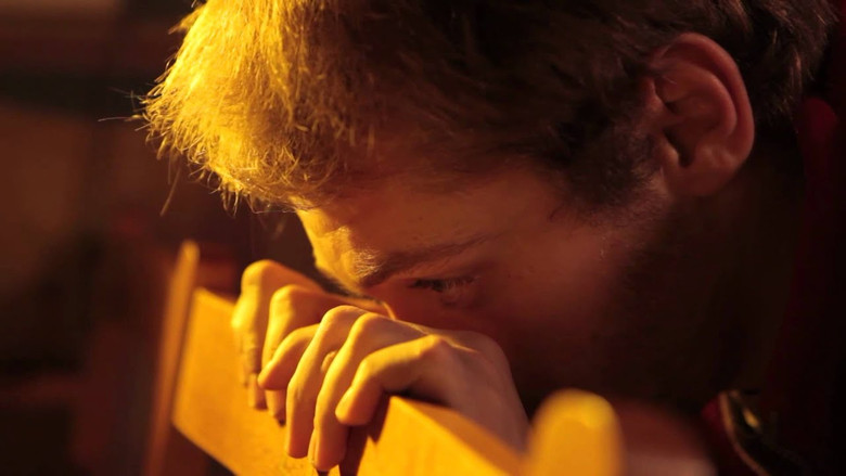 кадр из фильма Το Αγόρι Τρώει το Φαγητό του Πουλιού