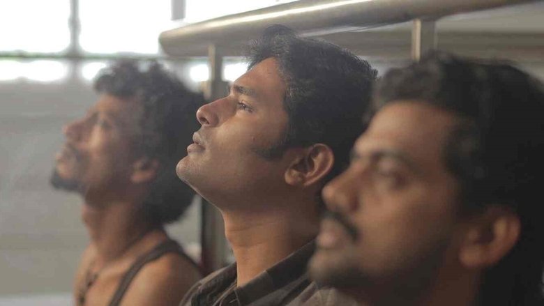 кадр из фильма மூடர் கூடம்