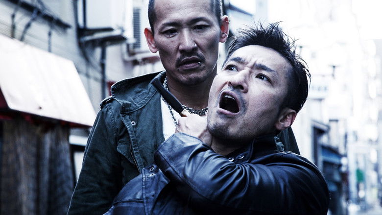 кадр из фильма 一族（ファミリー）の絆