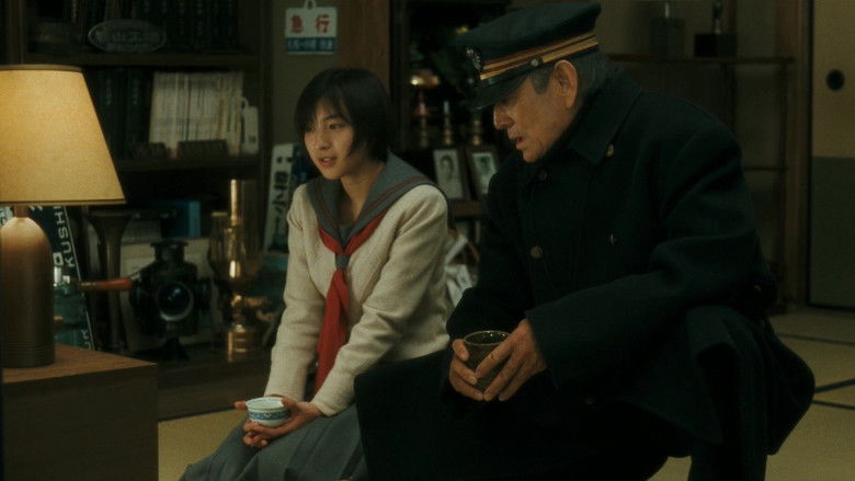 кадр из фильма 鉄道員