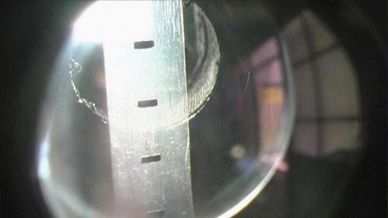 кадр из фильма わっか九ミリ半