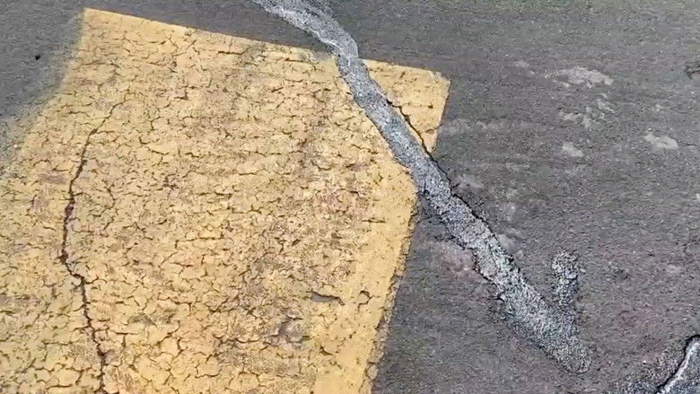 кадр из фильма Introduction to Crack Sealing 2