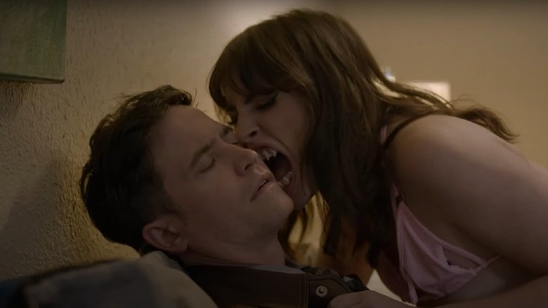 кадр из фильма Piranha Women