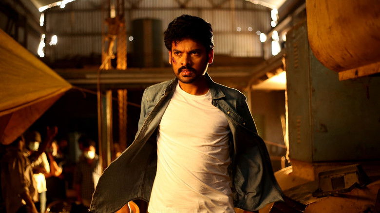 кадр из фильма துடிக்கும் கரங்கள்