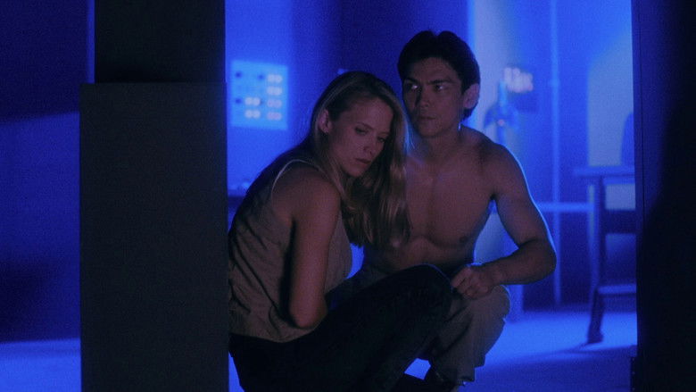 кадр из фильма Киборг–охотник