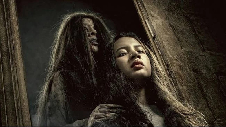 кадр из фильма Mama