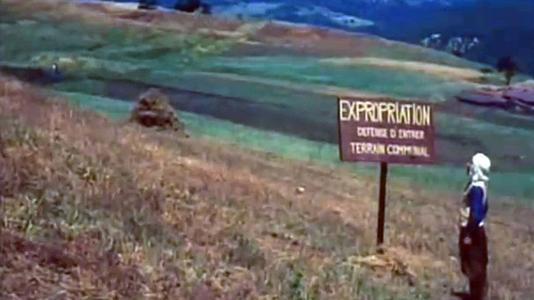 кадр из фильма Les Déracinés