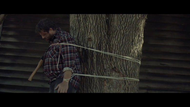 кадр из фильма Затаившийся в лесу