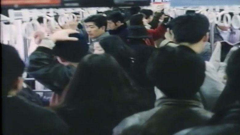 кадр из фильма 痴漢電車 奥まで押し込め！
