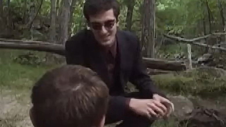 кадр из фильма The Man in the Black Suit