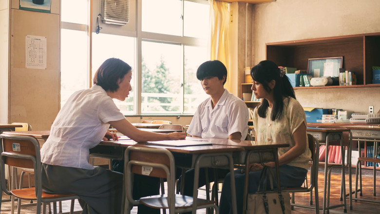 кадр из фильма Живя в двух мирах