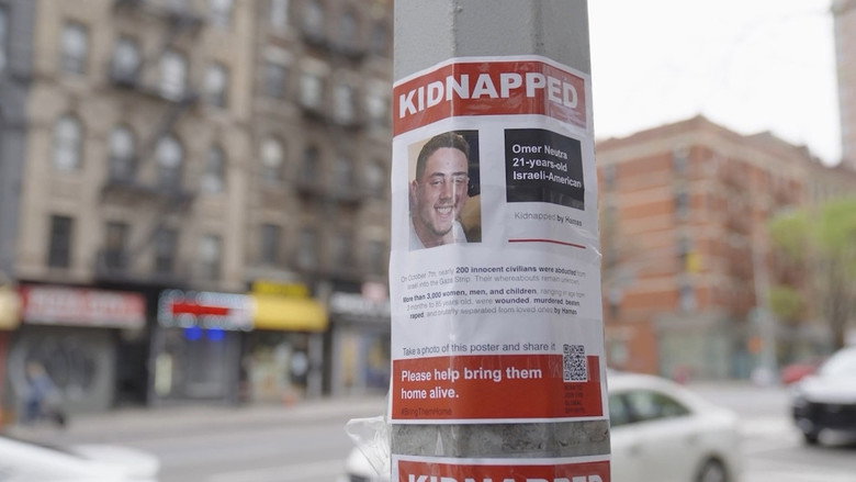 кадр из фильма Torn: The Israel-Palestine Poster War on New York City Streets