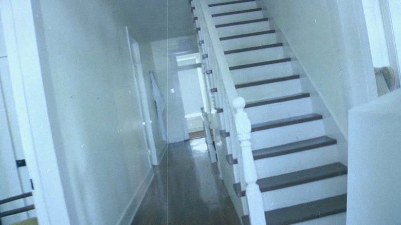 кадр из фильма Он живёт на чердаке