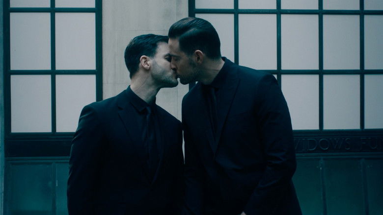 кадр из фильма The Suit Weareth the Man