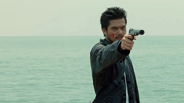 кадр из фильма มือปืน/โลก/พระ/จัน