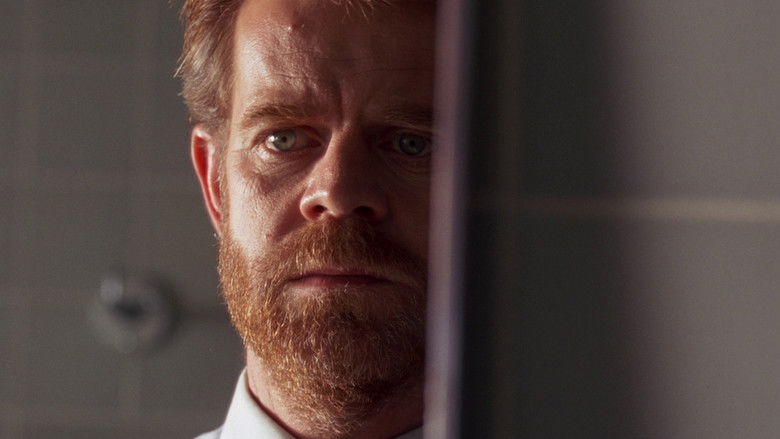 кадр из фильма Oleanna