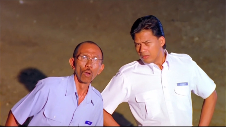 кадр из фильма Hantu Kak Limah Balik Rumah