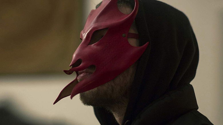 кадр из фильма Убийца внутри меня