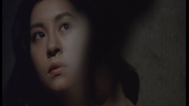 кадр из фильма 凌辱めす市場　監禁