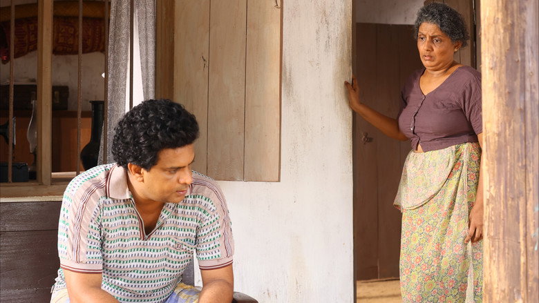 кадр из фильма එදා රෑ