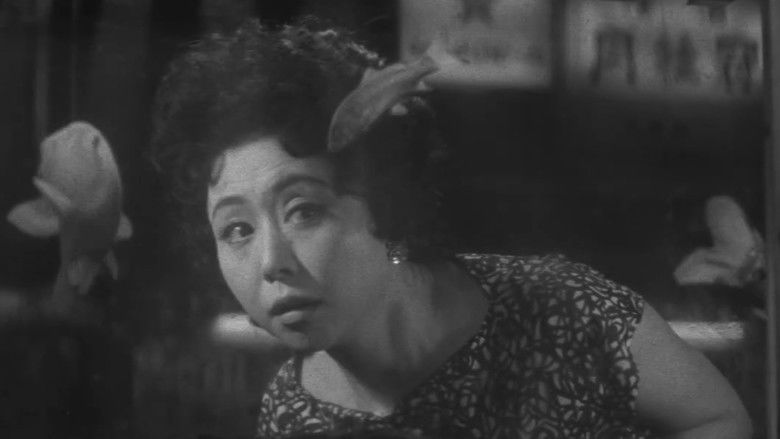 кадр из фильма 強虫女と弱虫男