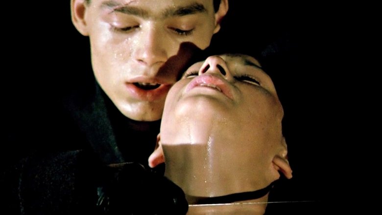 кадр из фильма За стеклом