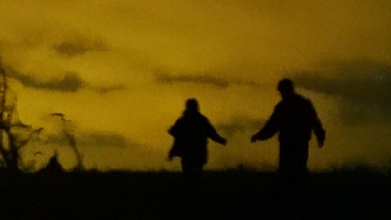 кадр из фильма Figures Around a Fire