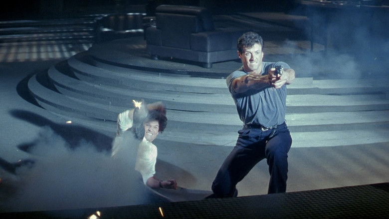 кадр из фильма Танго и Кэш