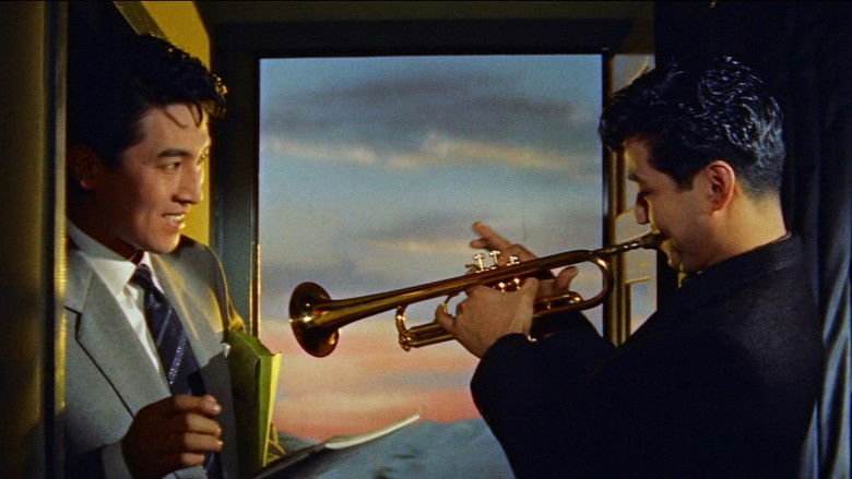 кадр из фильма 嵐を呼ぶ楽団