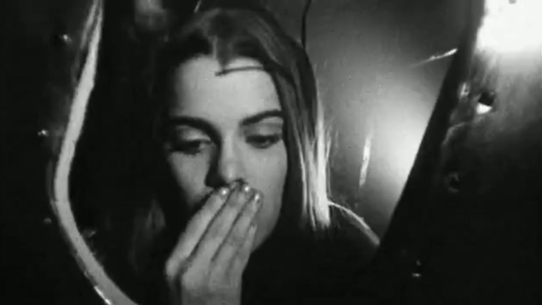 кадр из фильма The Eye Like a Strange Balloon Mounts Toward Infinity