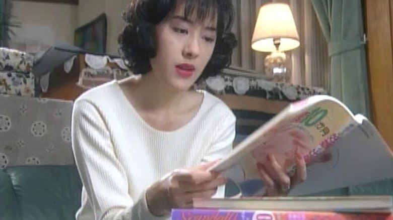 кадр из фильма あやしい人妻　テレクラ・リポート