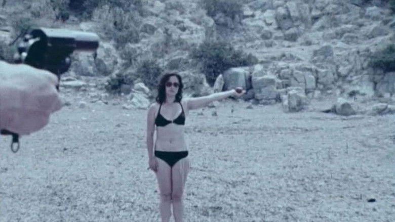 кадр из фильма Πέφτουν οι σφαίρες σαν το χαλάζι κι ο τραυματισμένος καλλιτέχνης αναστενάζει