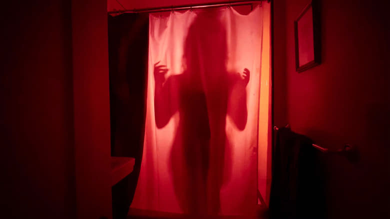 кадр из фильма He's Watching