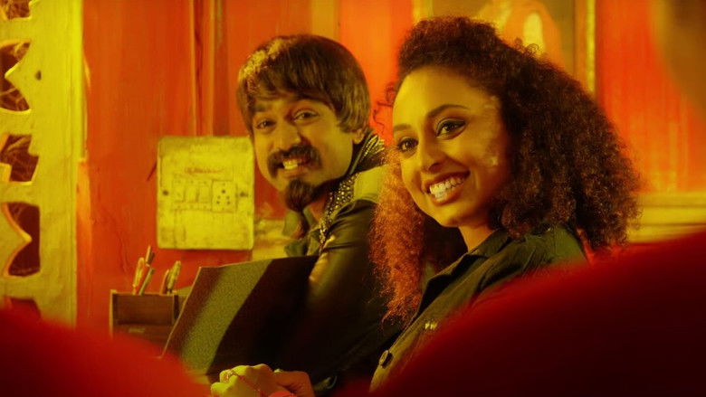 кадр из фильма ഡബിൾ ബാരൽ