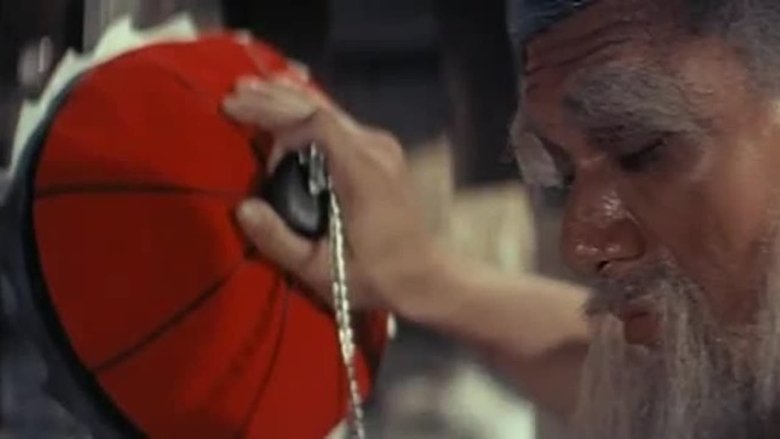 кадр из фильма Повелитель летающей гильотины