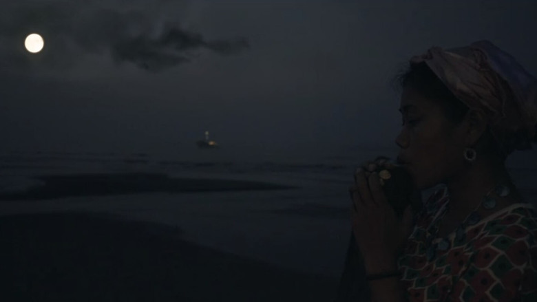 кадр из фильма ORU KARAKKUM MATTANEKANGALKKUMIDAYIL