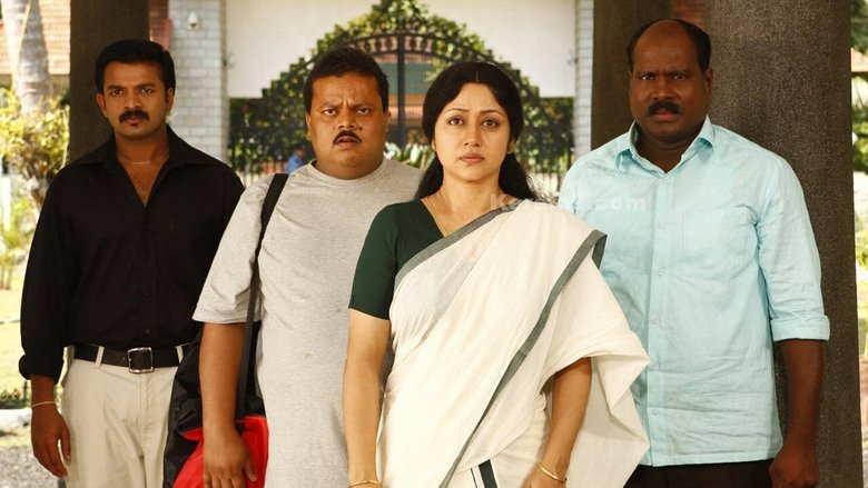 кадр из фильма ഒരു ബ്ലാക്ക് & വൈറ്റ് കുടുംബം