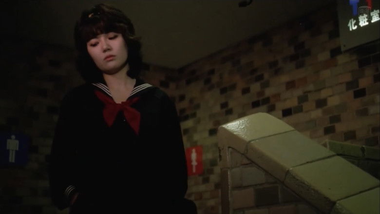 кадр из фильма 痴漢電車　いたずらな指