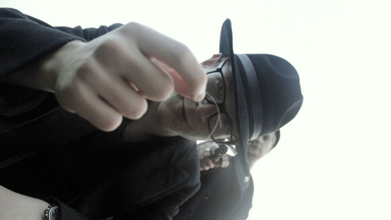 кадр из фильма Behind The Badge